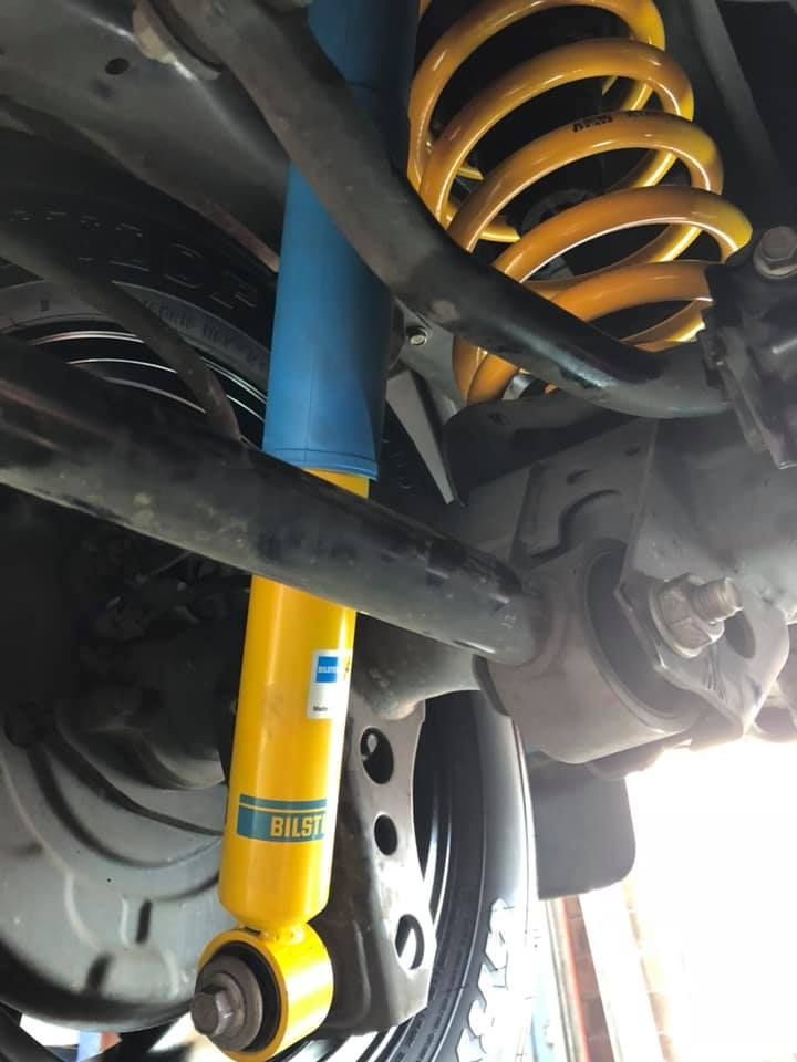 A Close Up of a Bilstein Shock Absorber on a Car — Westlakes 4x4 Centre in Maitland, NSW