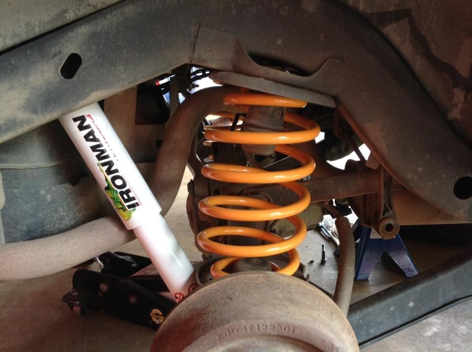 A Close Up of an Ironman Shock Absorber on a Car — Westlakes 4x4 Centre in Cessnock, NSW