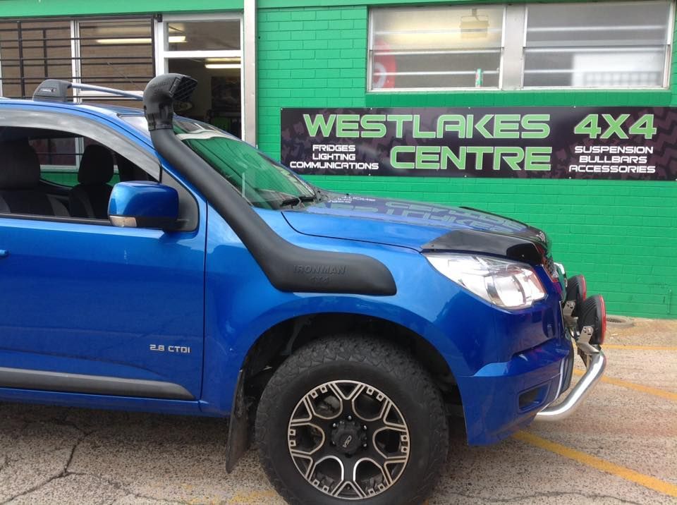 A Blue Truck is Parked in Front of a Westlakes 4x4 Centre — Westlakes 4x4 Centre in Cessnock, NSW
