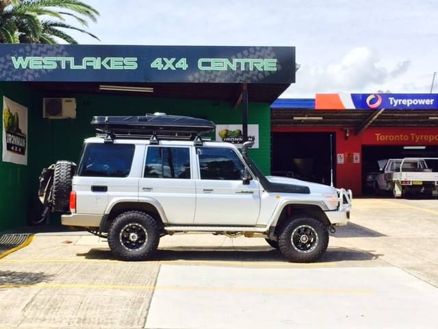 A White 4x4 is Parked in Front of a Westlakes 4x4 Centre — Westlakes 4x4 Centre in Newcastle, NSW
