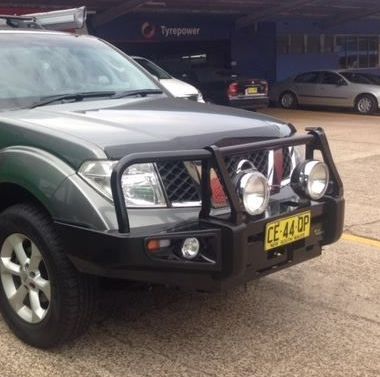 A Black Truck With a License Plate That Says Ce 44 Dp — Westlakes 4x4 Centre in Cessnock, NSW