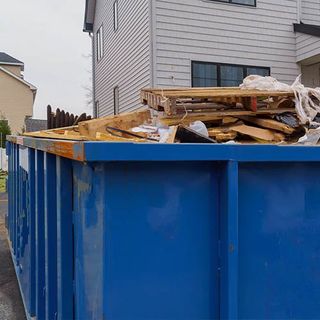 Container with Construction Debris — Pueblo, CO — Dionisio Roll-Off Service