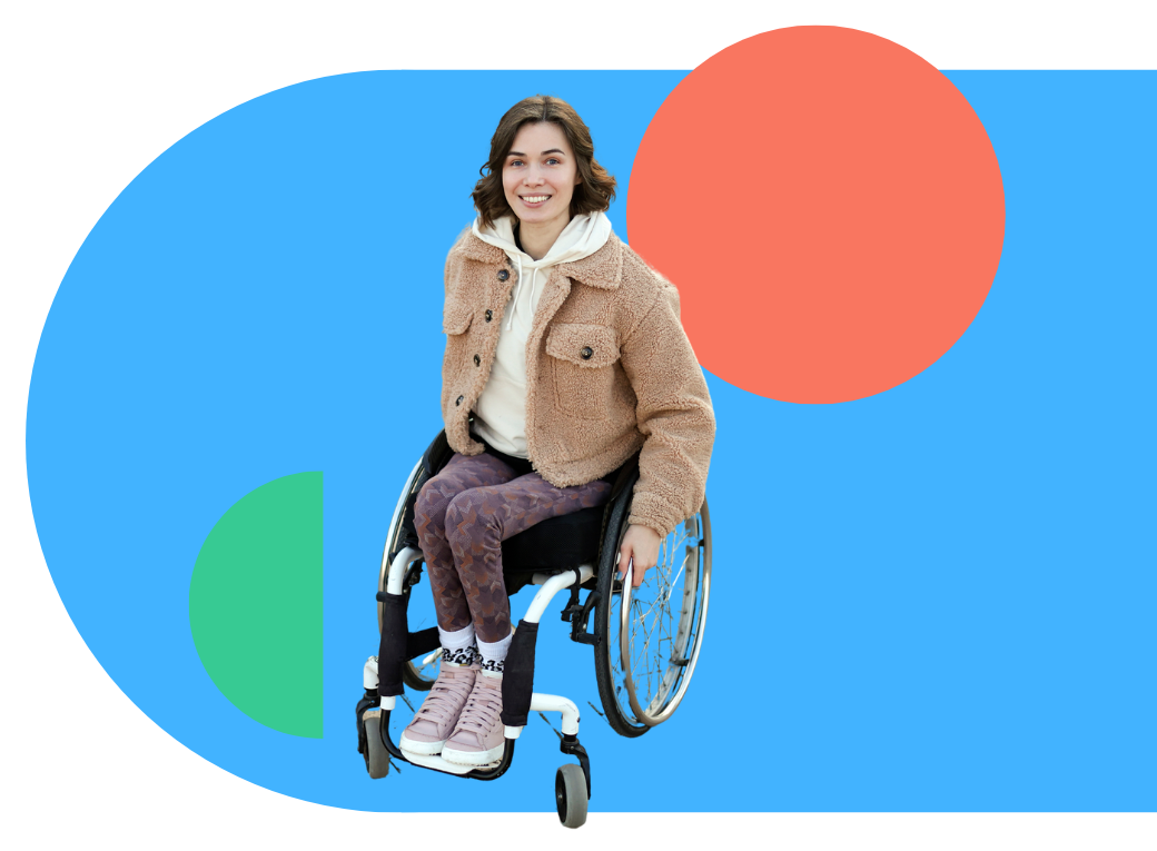 A woman is sitting in a wheelchair on a blue background.