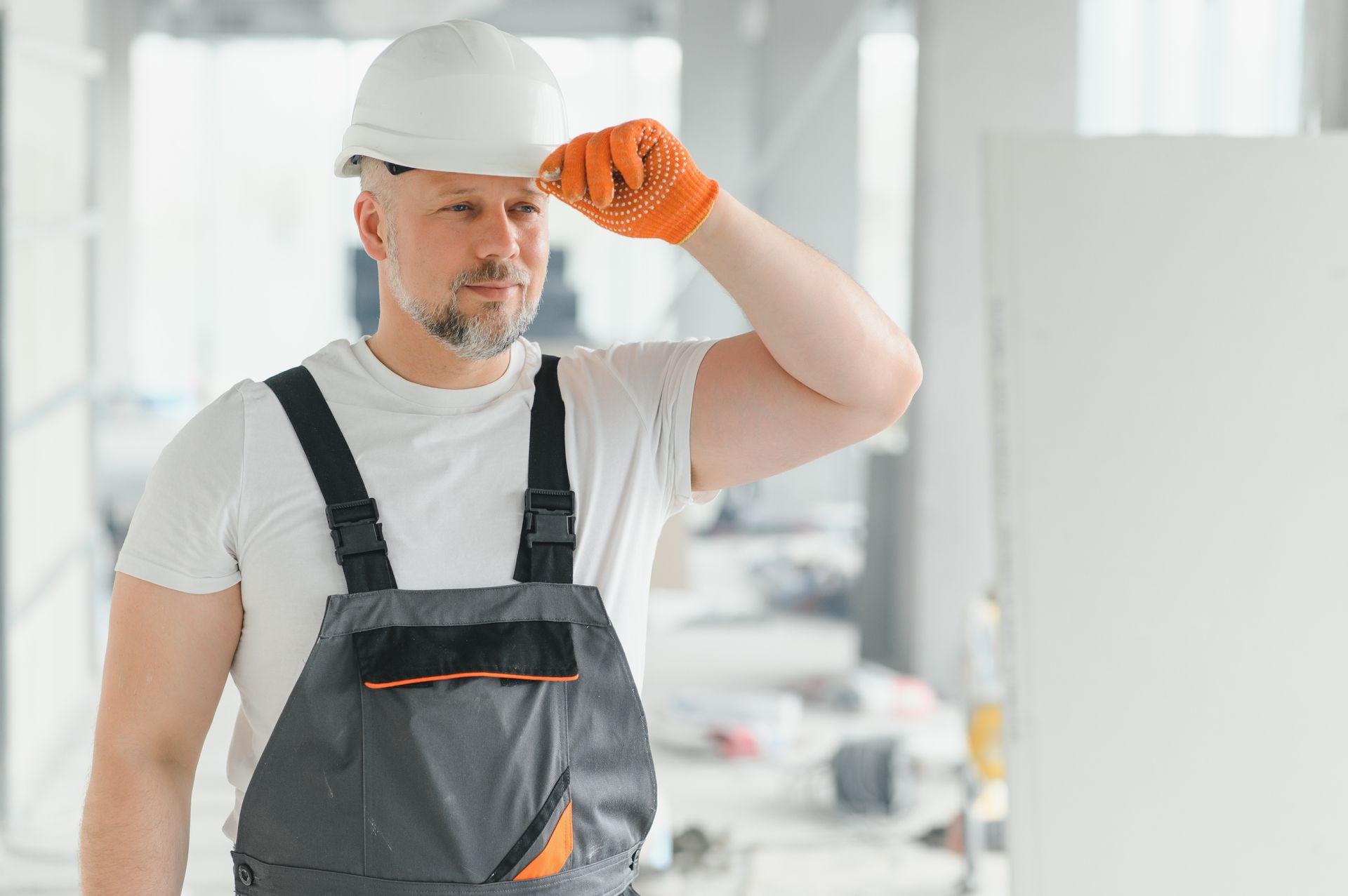 A man wearing a hard hat.