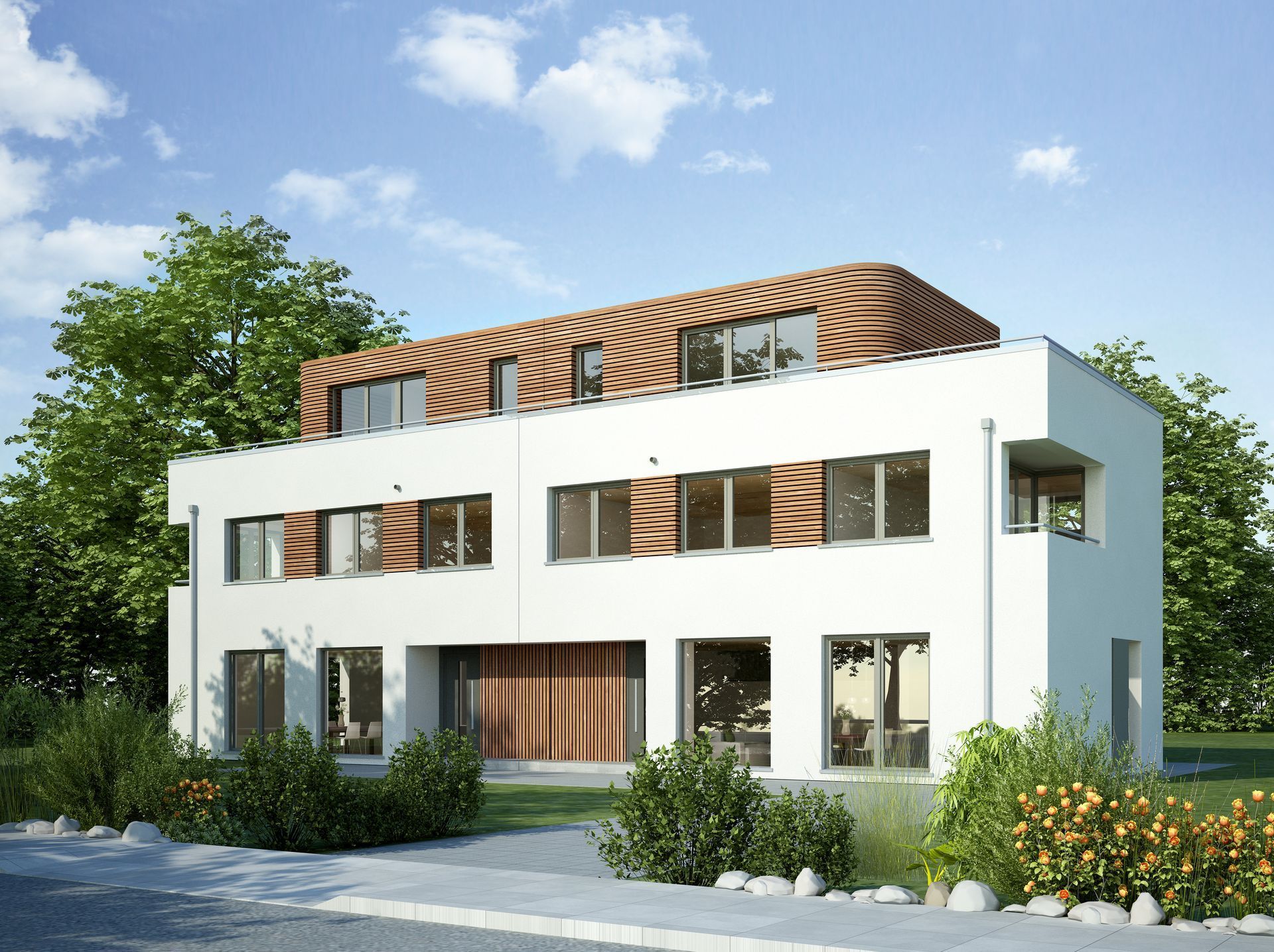 ein weißes Haus mit braunem Dach und vielen Fenstern