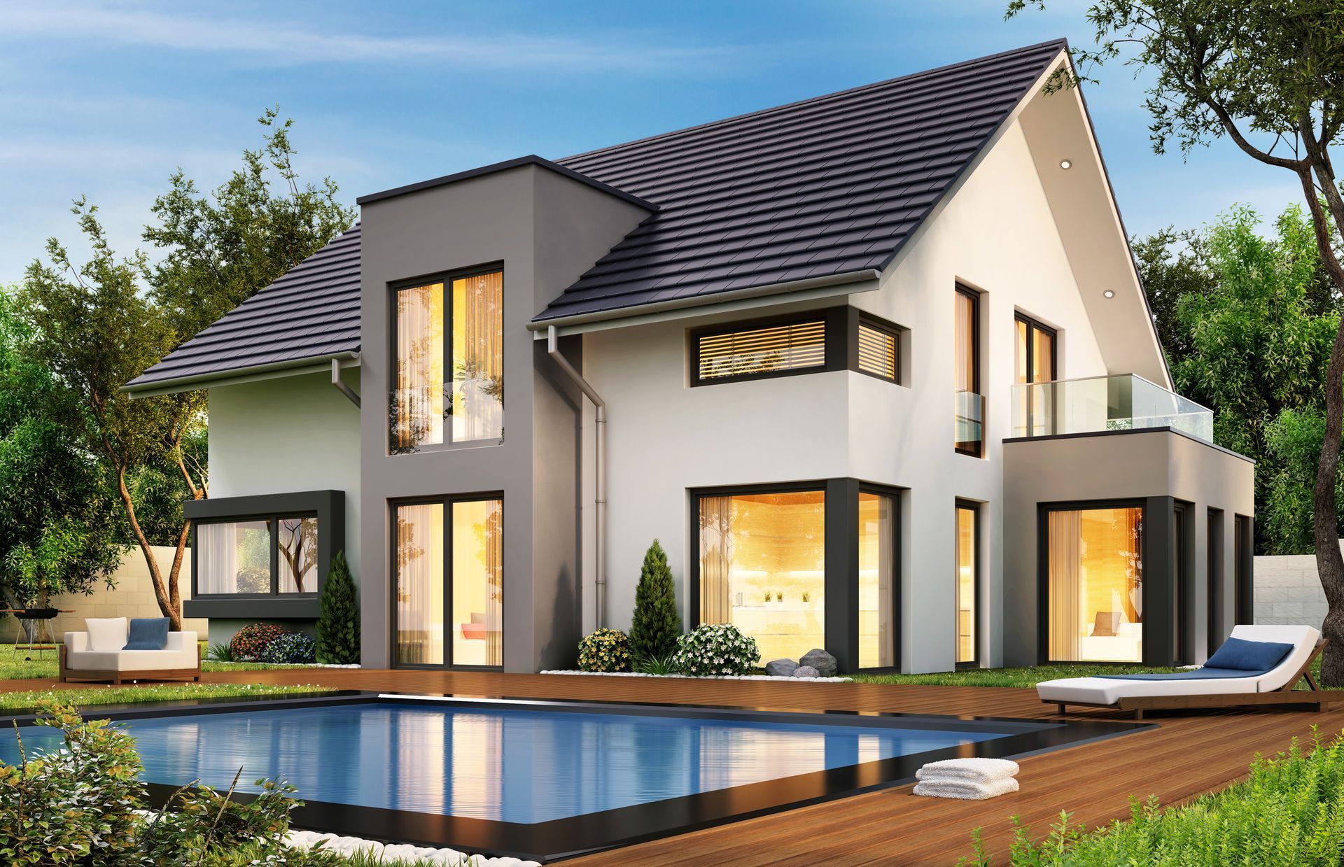 ein großes Haus mit einem Swimmingpool davor