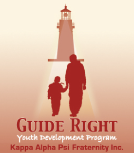 Silhouette of adult and child walking toward a lighthouse, 