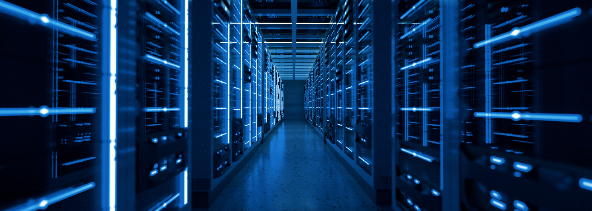 A hallway filled with rows of servers in a data center.