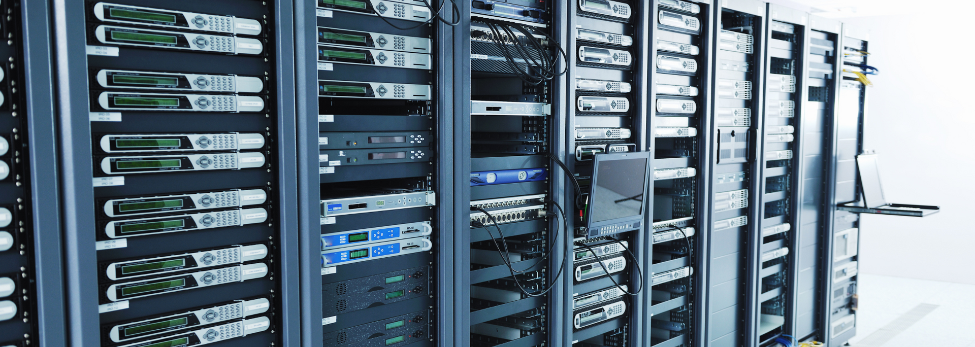 A row of servers are lined up in a data center.