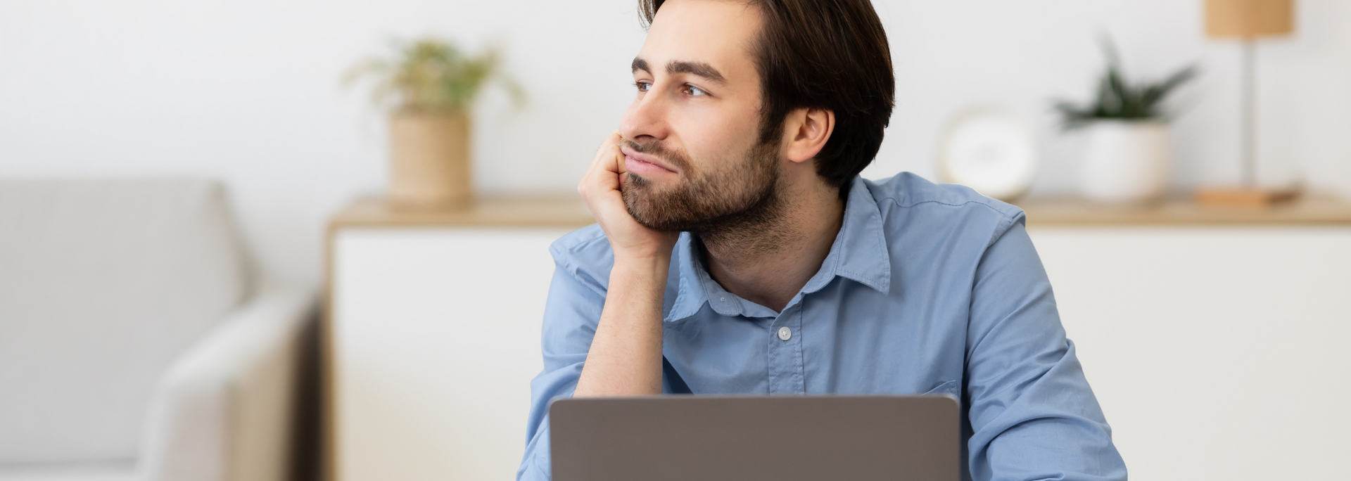 Picture of a businessperson looking bored.