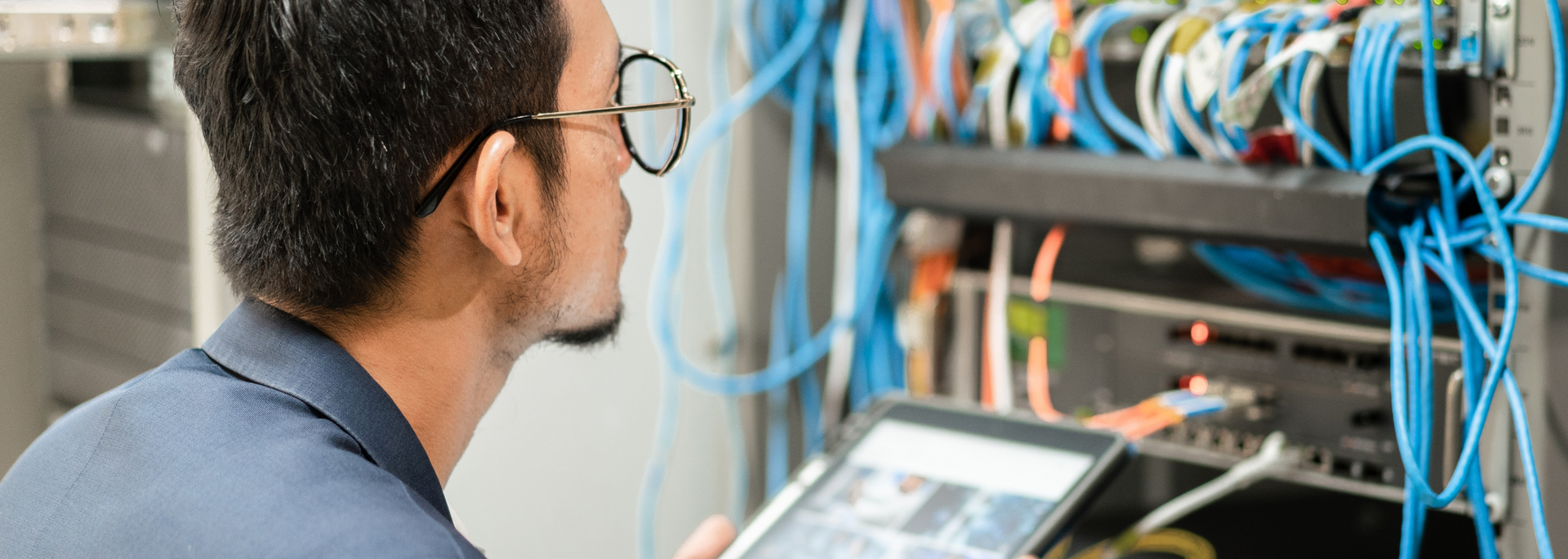 Picture of a technician working on a server.