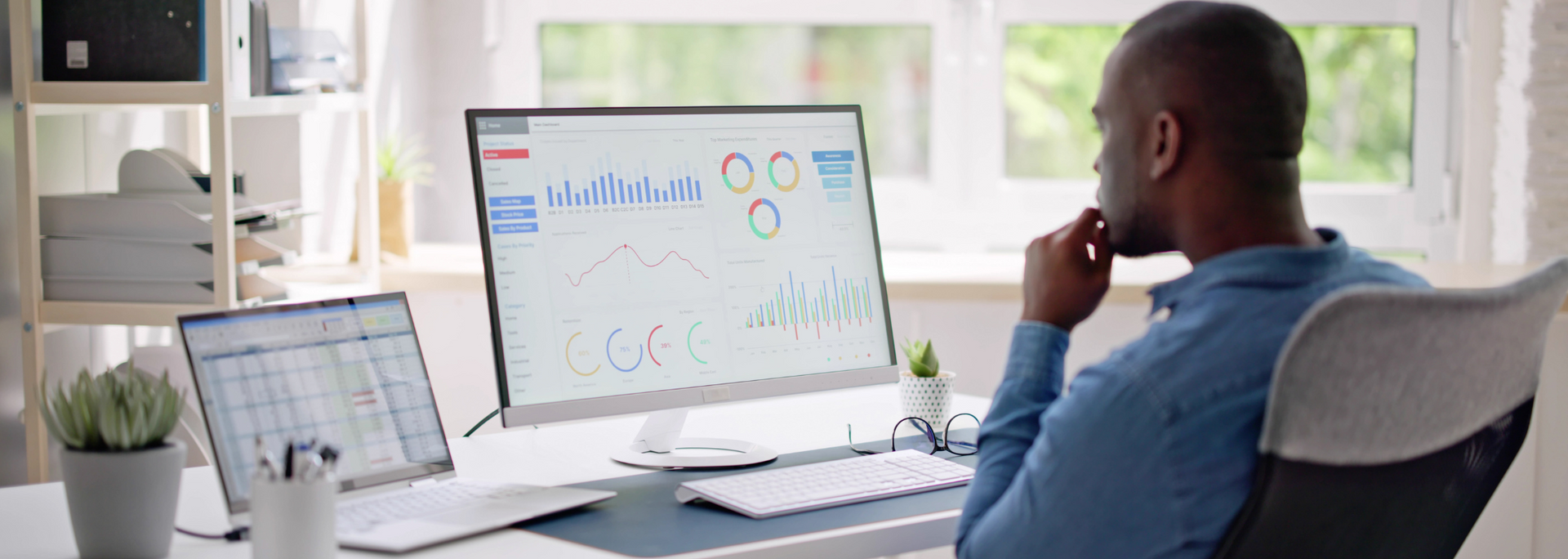 Picture of a professional looking at very important data on a computer monitor. Picture of a professional looking at very important data on a computer monitor.