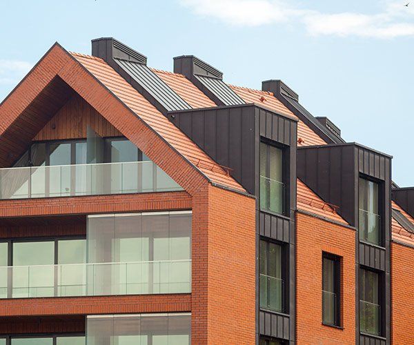 tall red brick apartments with modern design