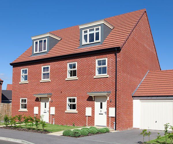 red brick home with red roof