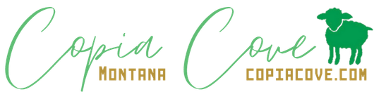 Logo for Copia Cove: green script text with a sheep silhouette and website address.