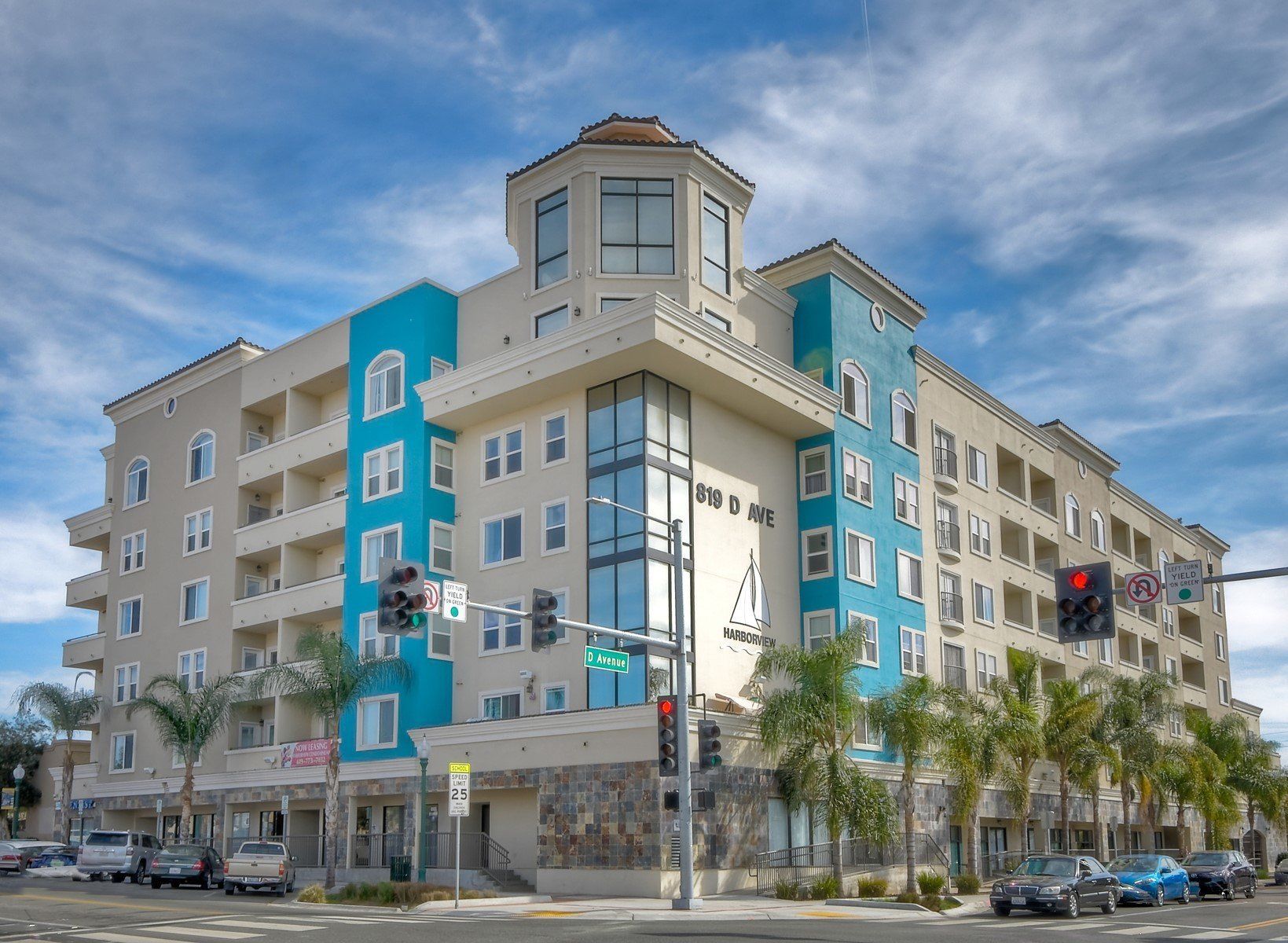 Photo of a 6-story apartment building seen from across the street