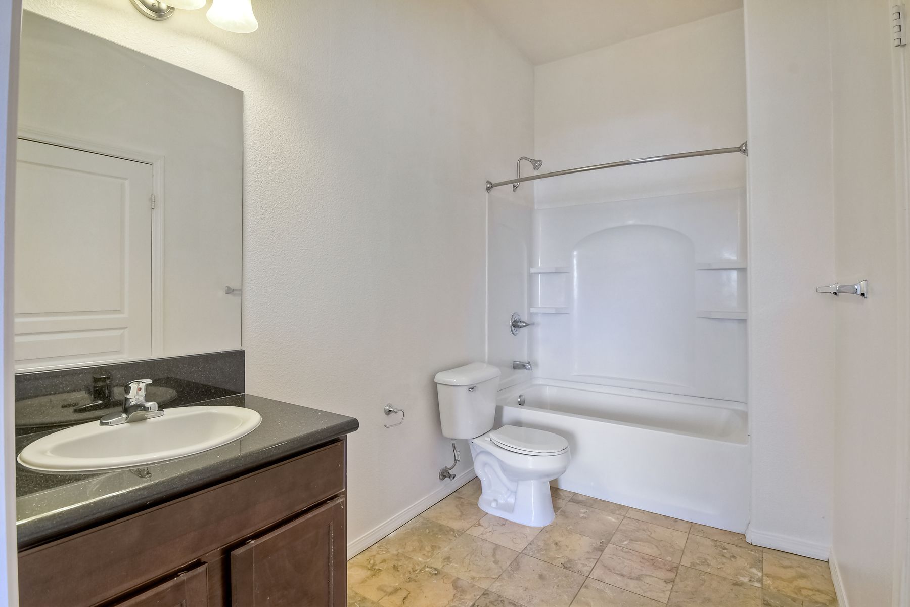 Photo of a bathtub/shower combo