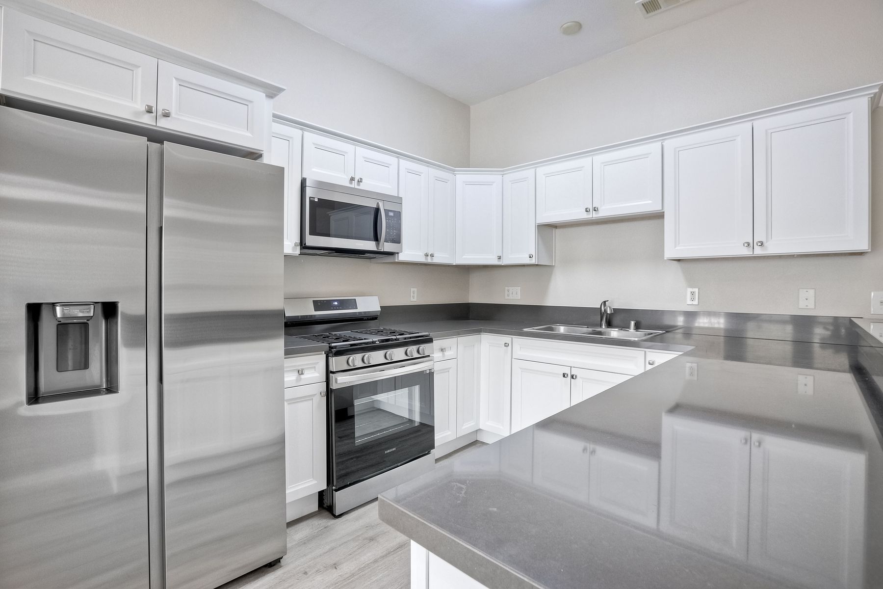Photo of a contemporary kitchen with plenty of cabinetry