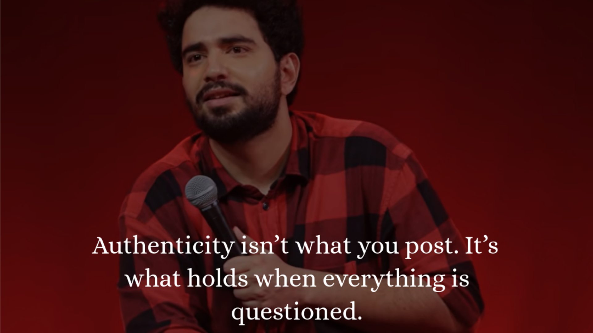 Scrabble tiles arranged in a pyramid shape spell