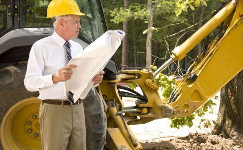 Man Inspecting Site — Wagga Wagga, NSW — Kennedy Bros Earthmoving Man Inspecting Site — Wagga Wagga, NSW — Kennedy Bros Earthmoving