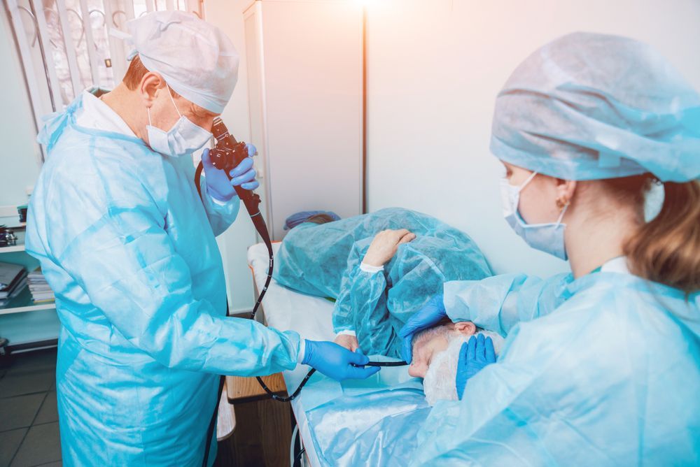 A Surgeon is Examining a Patient With an Endoscope in a Hospital — ACT Law Associates In Woden, ACT