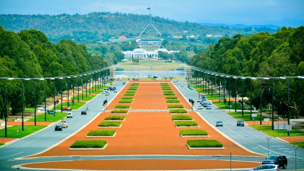 A Very Long Road With a Building in the Background — ACT Law Associates In Tuggeranong, ACT