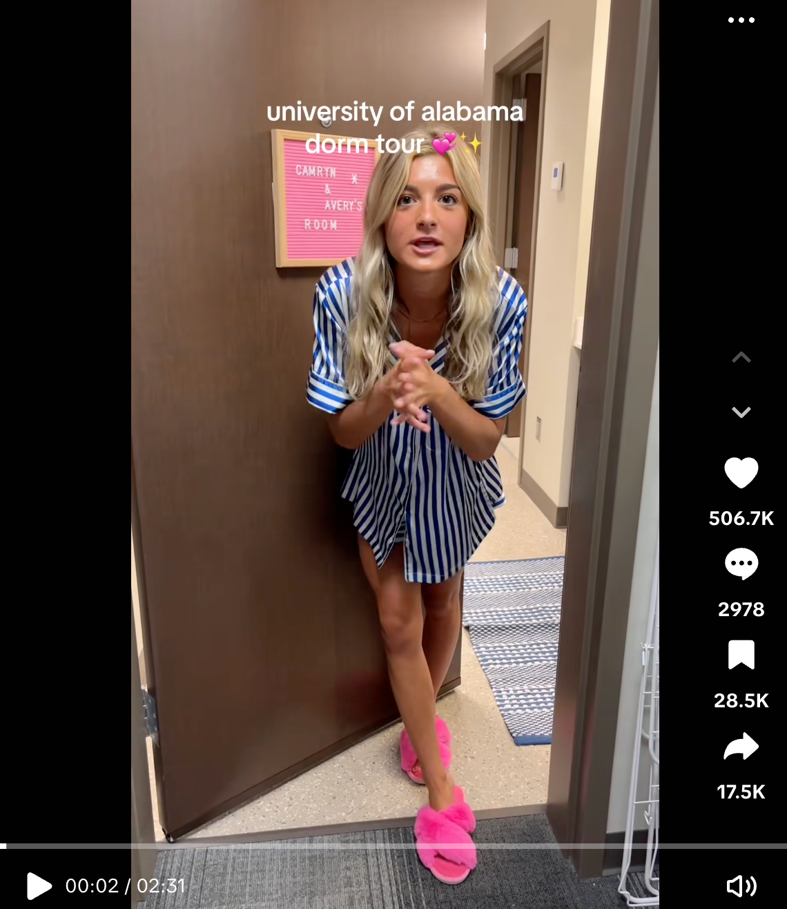 White, blonde student at the University of Alabama shows off her dorm room furniture and decor.