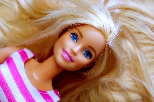 Barbie doll with a lot of long blonde hair.