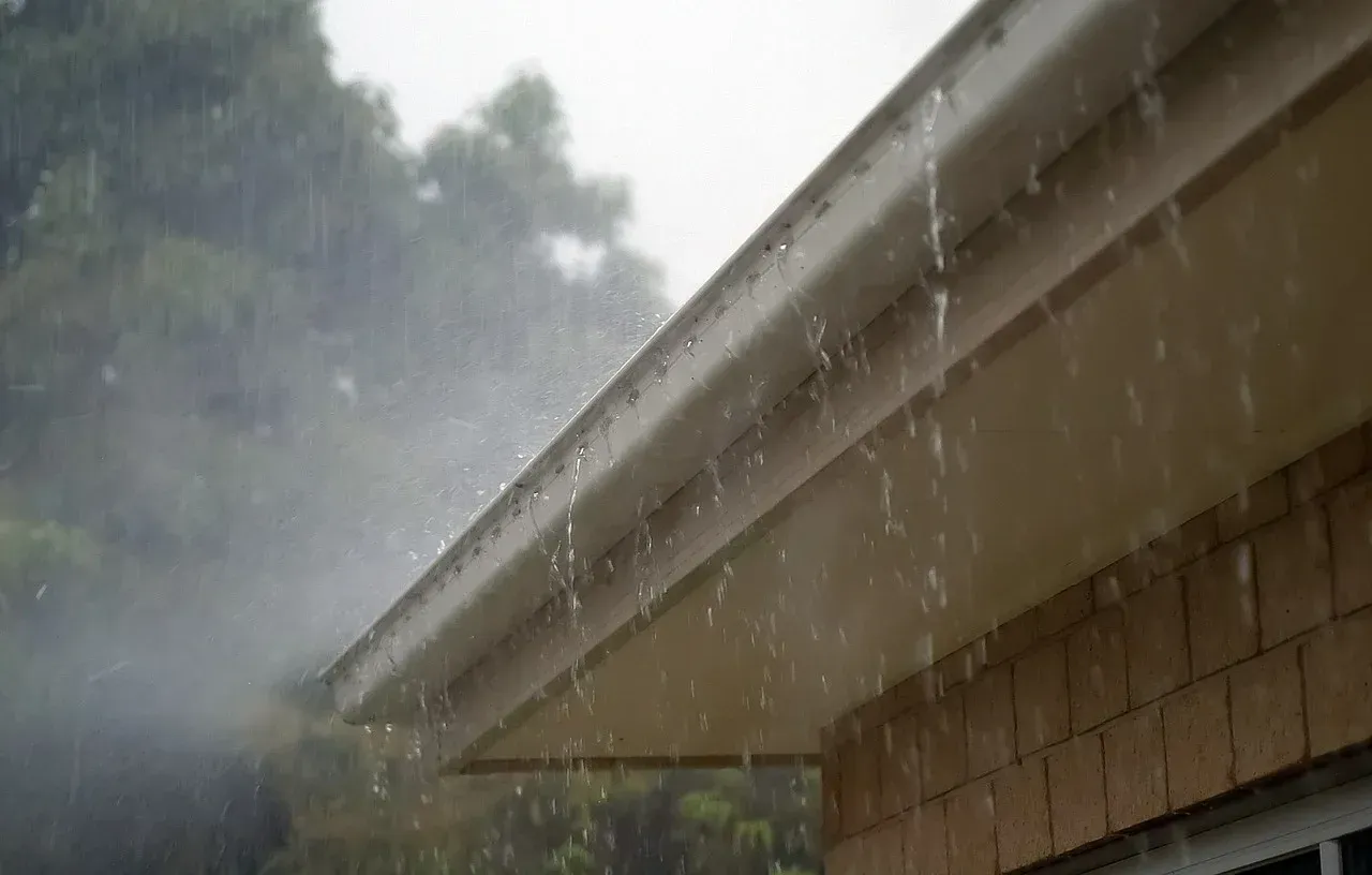 rain leaking through a gutter