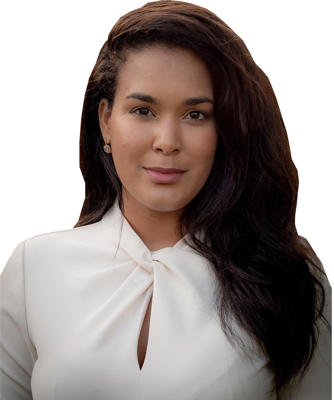 A woman with long dark hair is wearing a white shirt