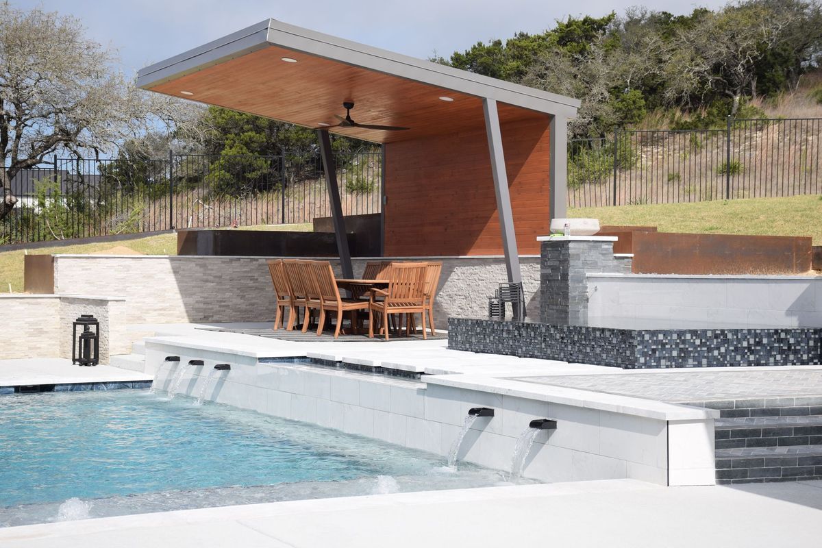 Raised waterfall custom swimming pool Boerne, Texas