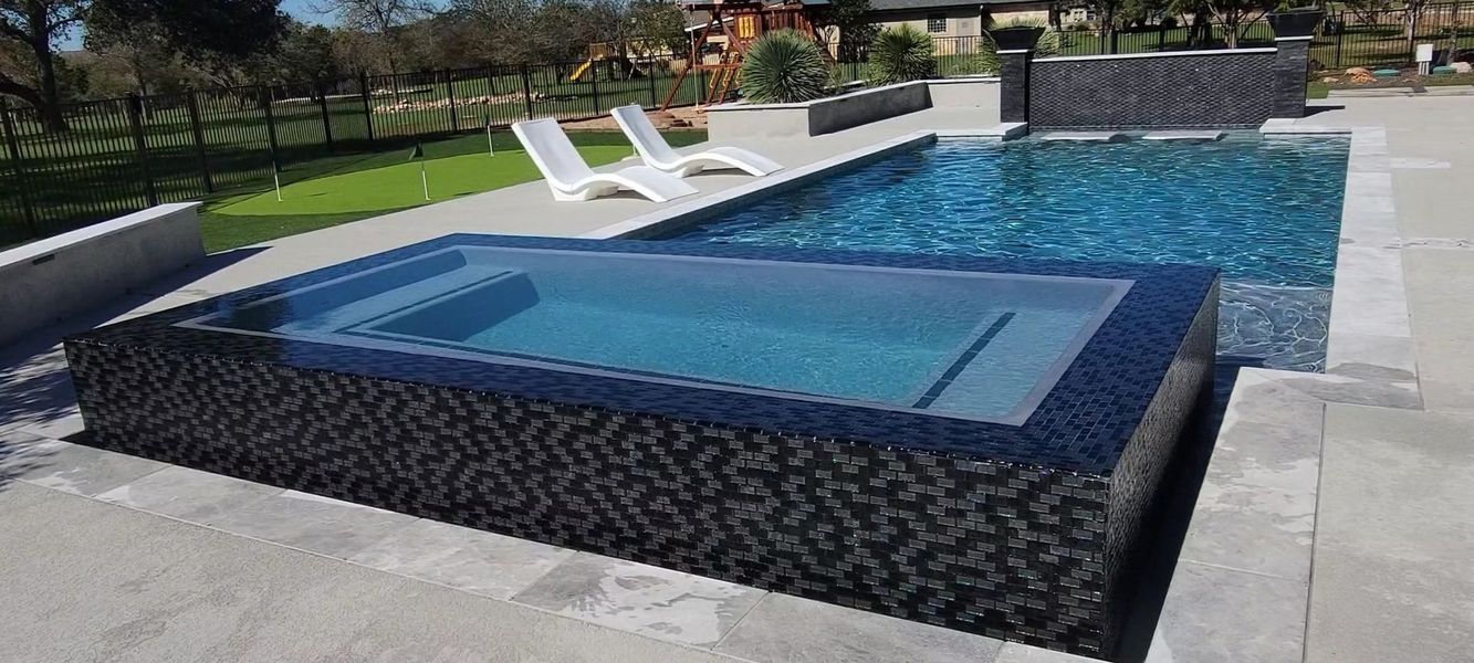 PebbleTec plaster custom pool in New Braunfels Texas
