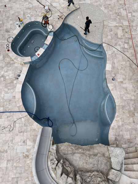 blue spa and pool in PebbleTec plaster Boerne Texas