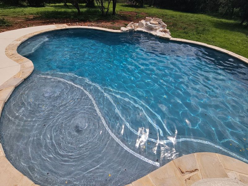 Tanning ledge addition in a renovation of Swimming Pool is possible with J. Oliver Custom Pools & Design