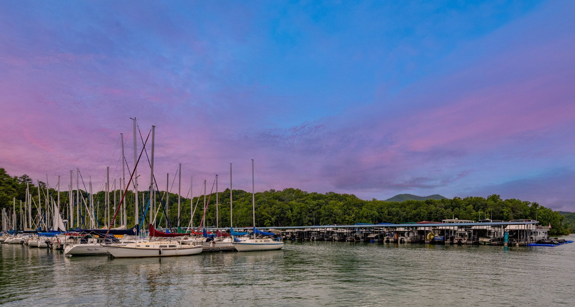 A large body of water with boats docked in it