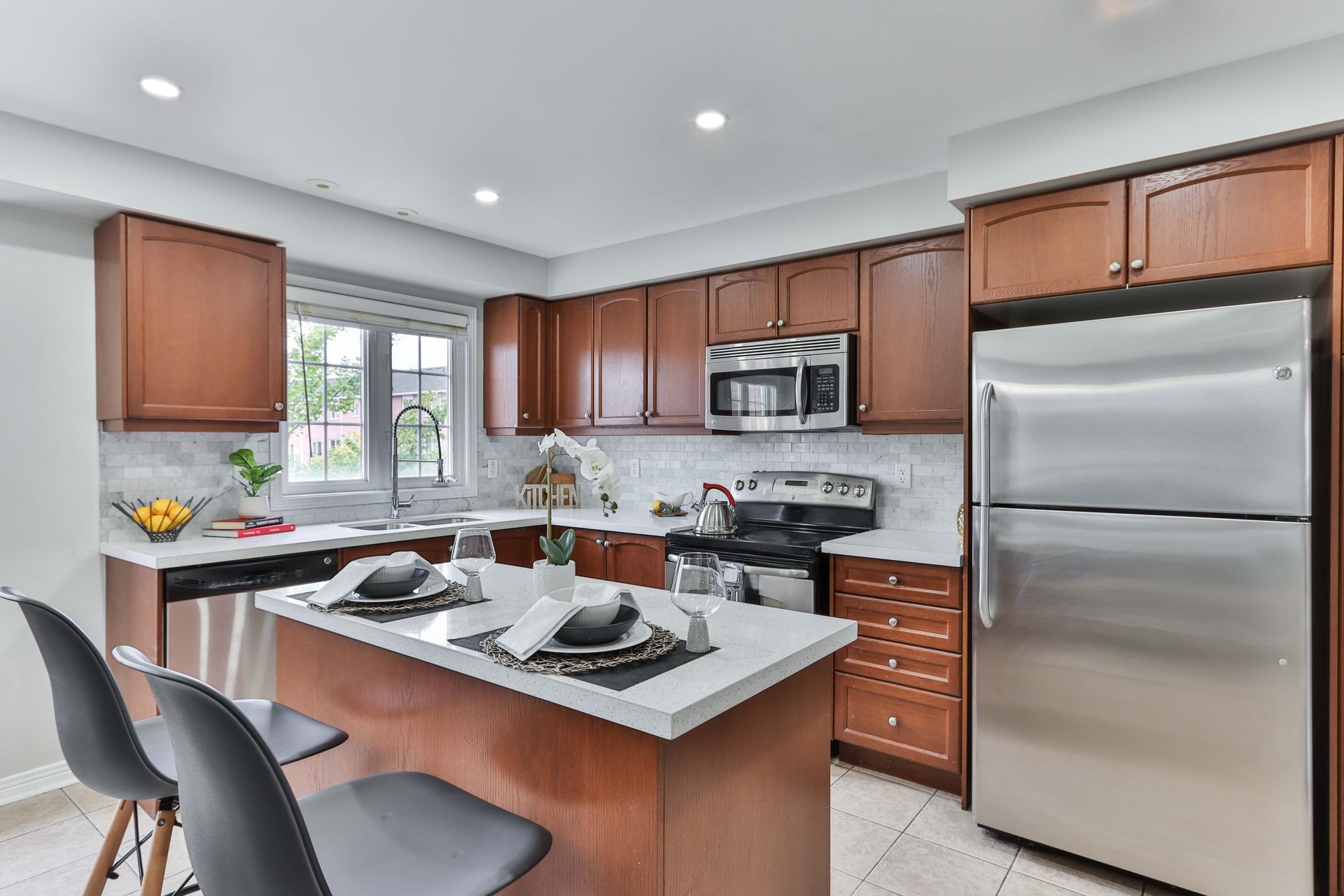 new kitchen with walnut cabinets