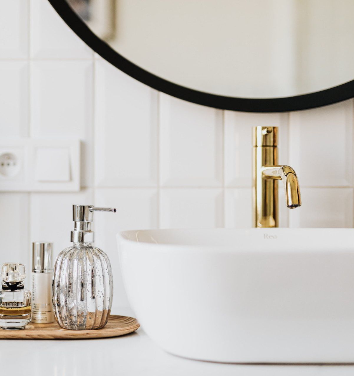 a bathroom with a sink, mirror, and soap dispenser: 10 Smart Bathroom Renovation Ideas to Elevate Your Home in 2024.