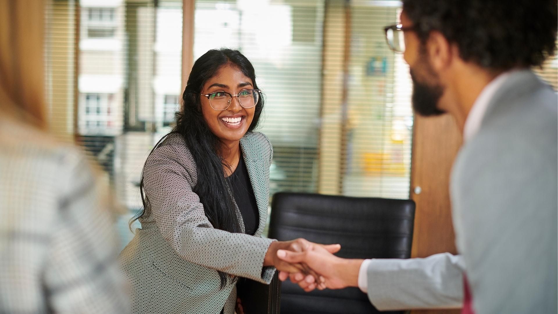 woman shaking hands