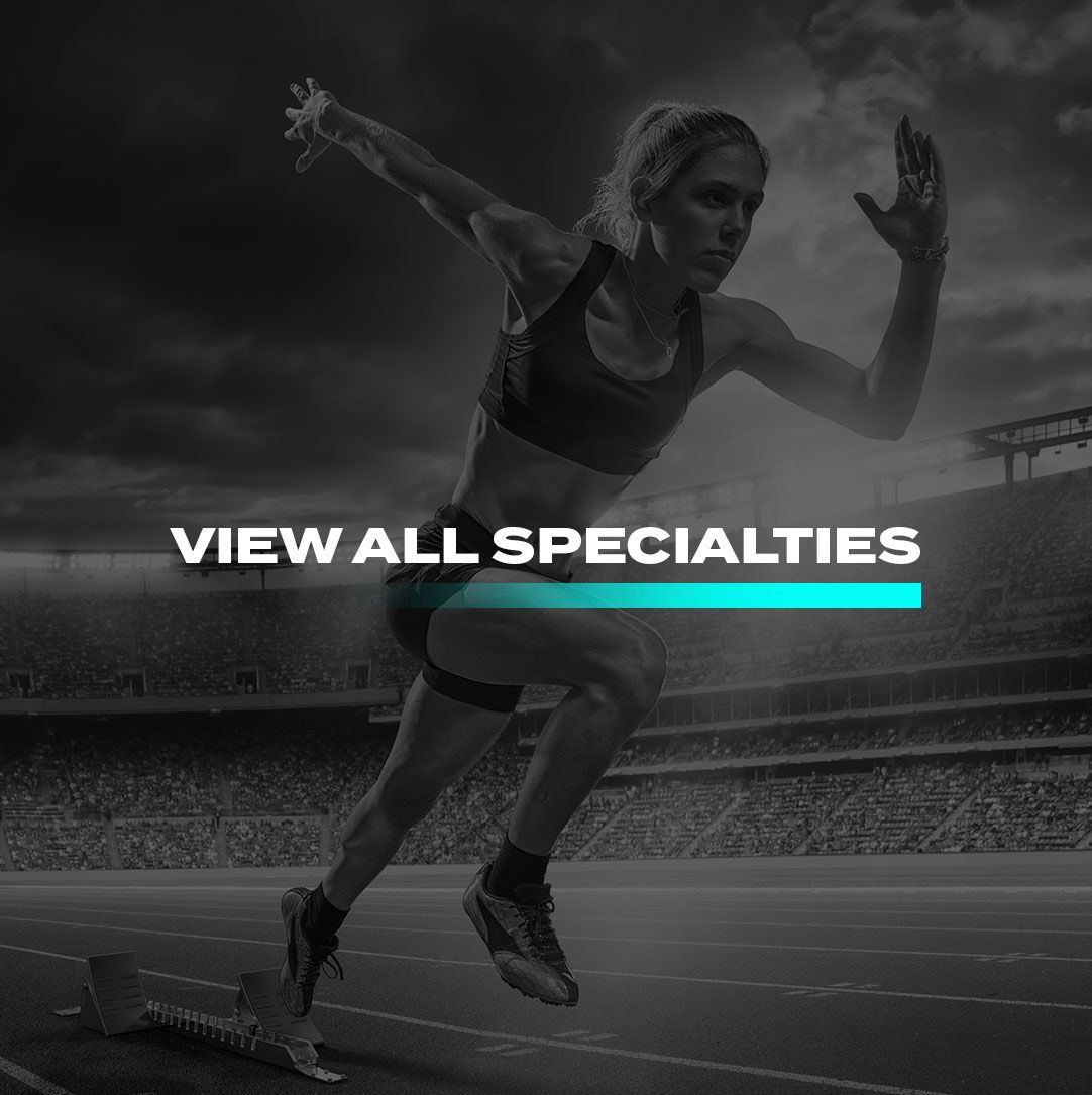 A woman is running on a track with the words `` view all specialties '' above her.