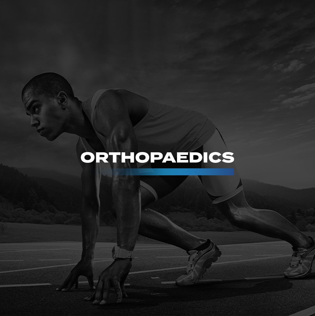 A man is getting ready to run on a track with the words orthopaedics above him.