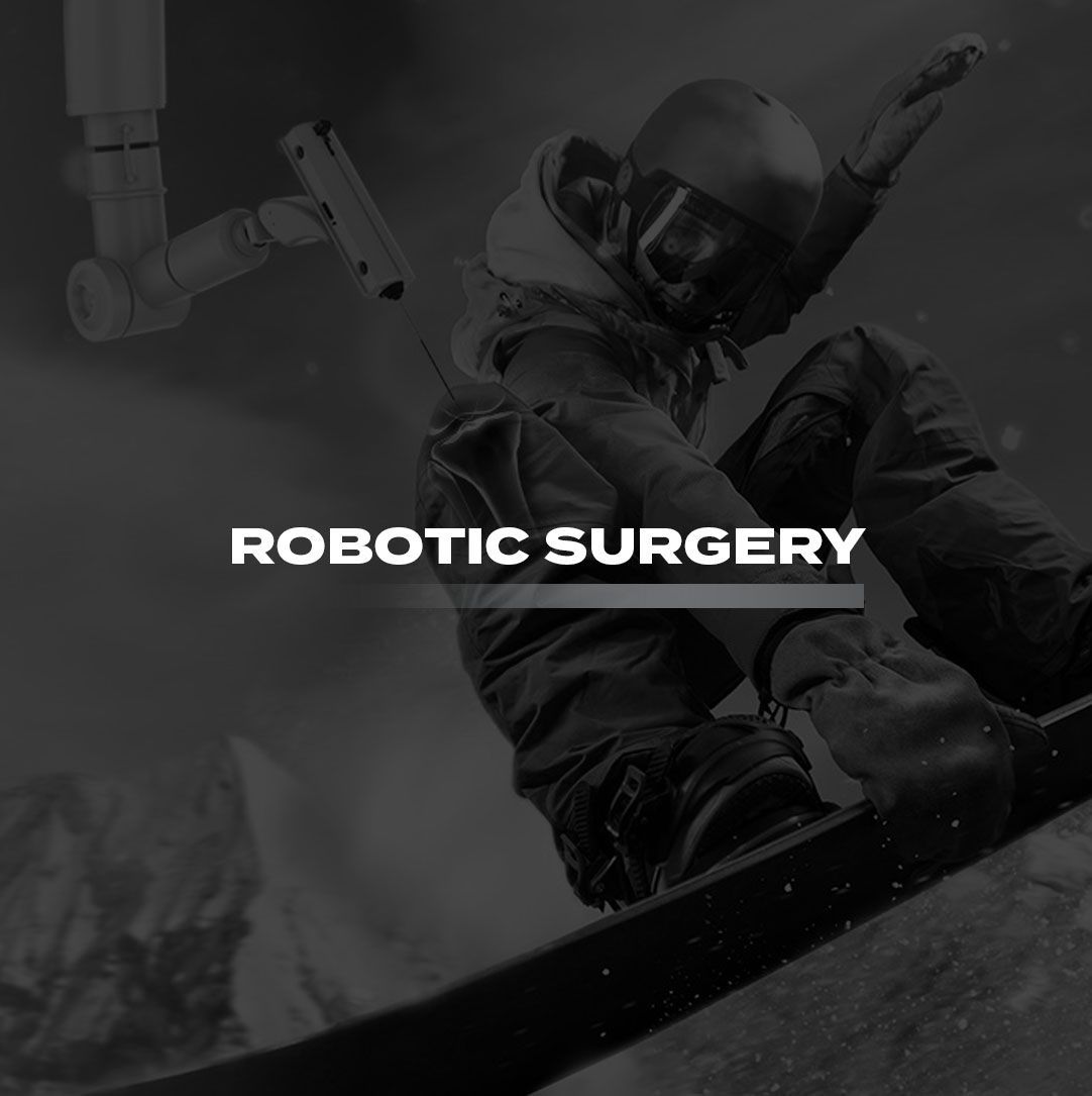 A black and white photo of a person on a snowboard with the words robotic surgery on the bottom