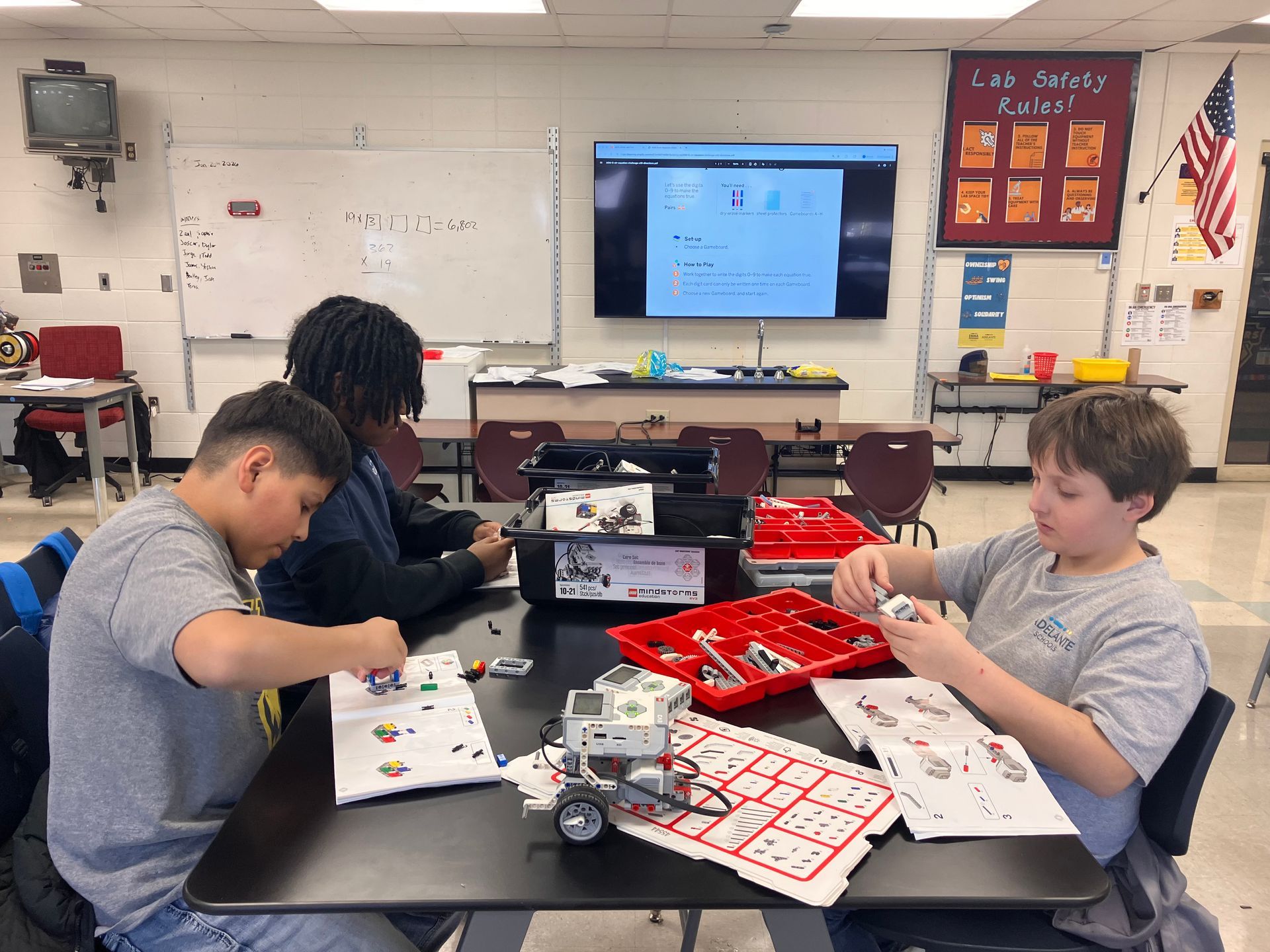 Students participating in a science lab with Mr. Keys.