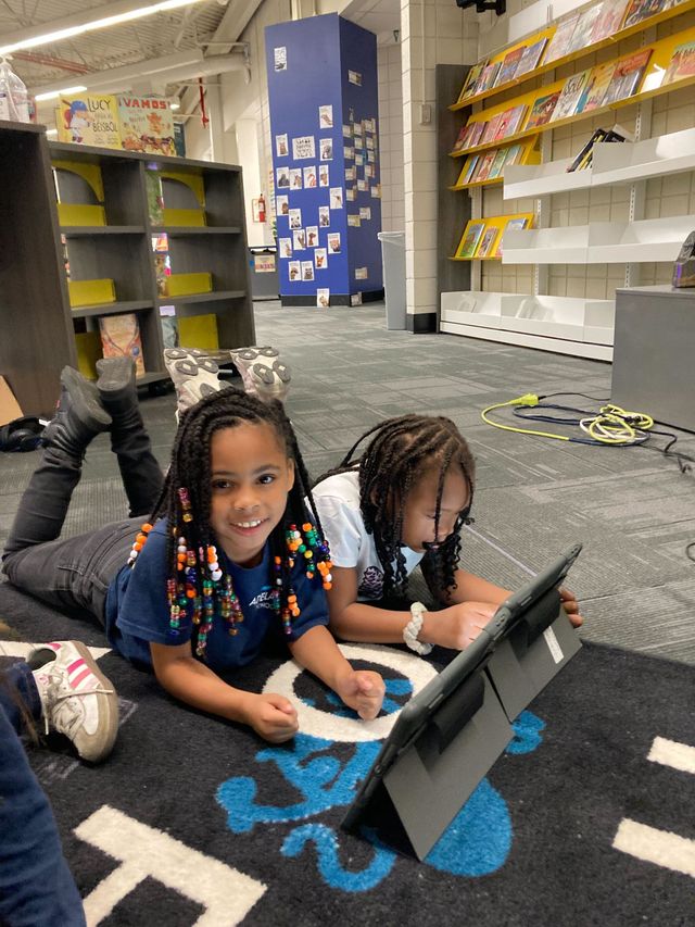 First grade students practicing coding in Digital Literacy.