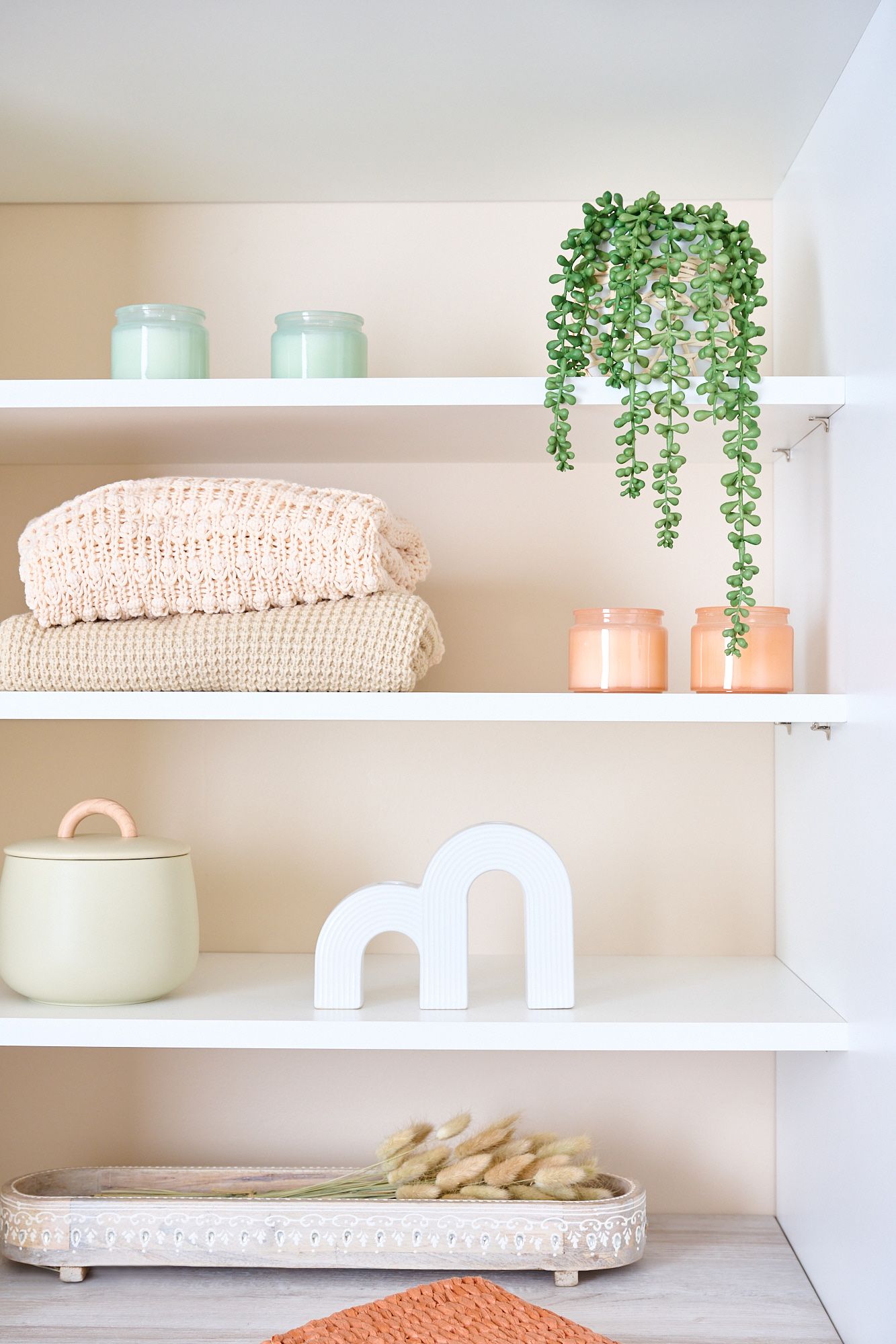 Lagoon and white closet shelves