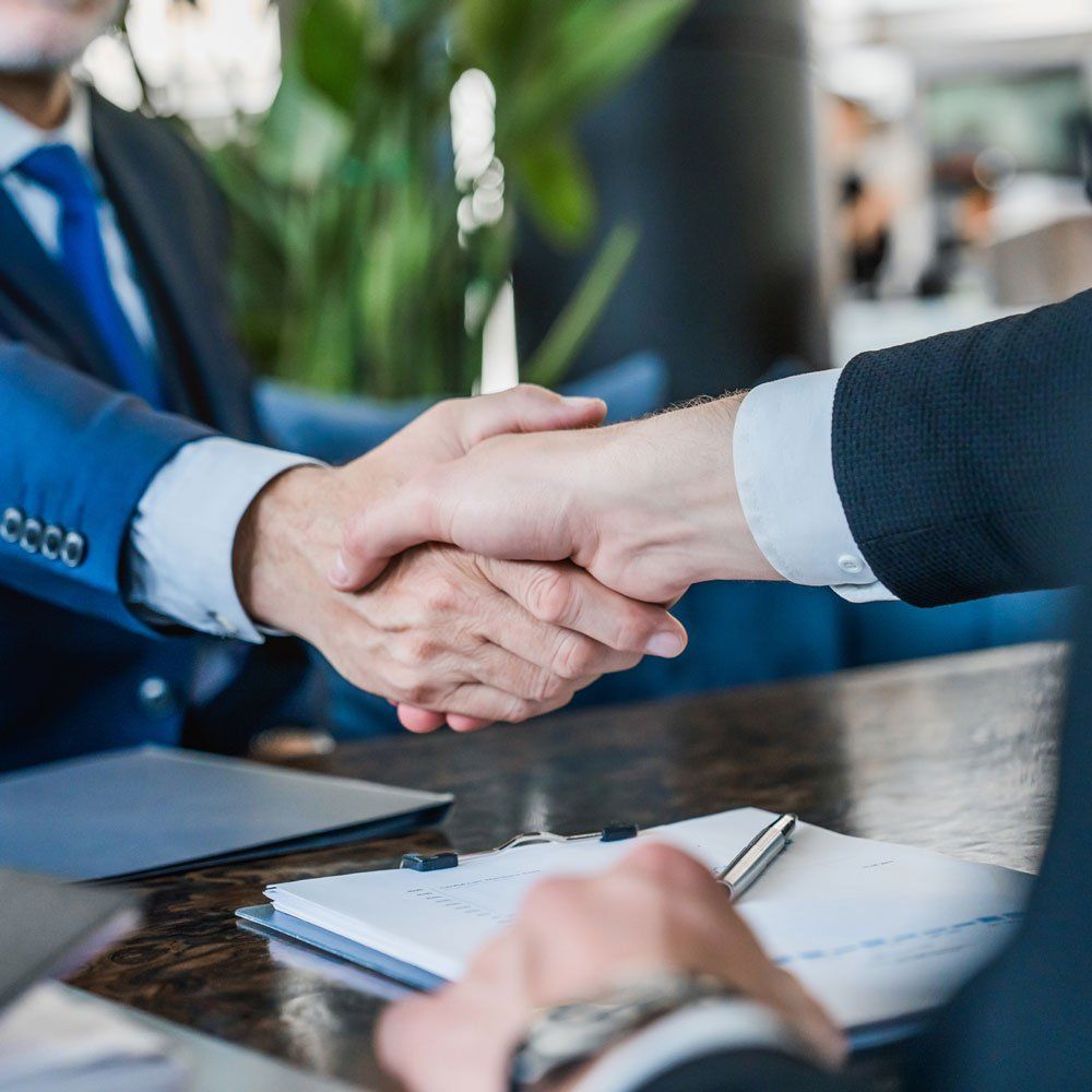 Business Handshake — Miami, FL — Security Bond Associates, Inc.