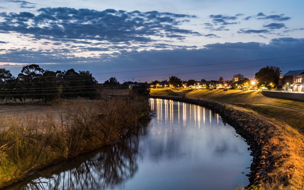 Dawn Over The Town River — Wholesale Window Coverings in Maitland, NSW