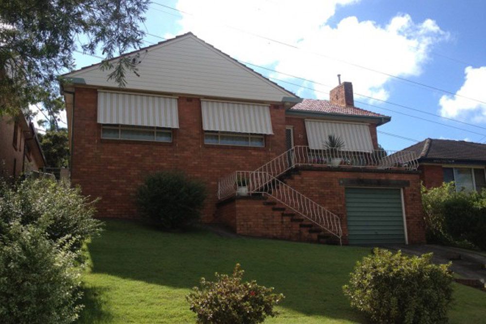 Exterior House With Three Awnings — Wholesale Window Coverings in Maitland, NSW
