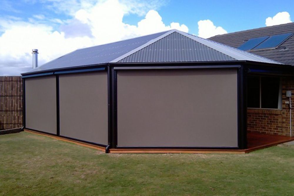 Outdoor Area With A Pergola And Blinds — Wholesale Window Coverings in Maitland, NSW
