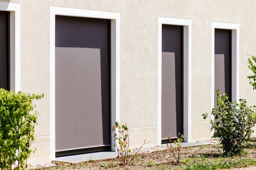 External Shutters On Window Or Terrace Door — Wholesale Window Coverings in Port Stephens, NSW