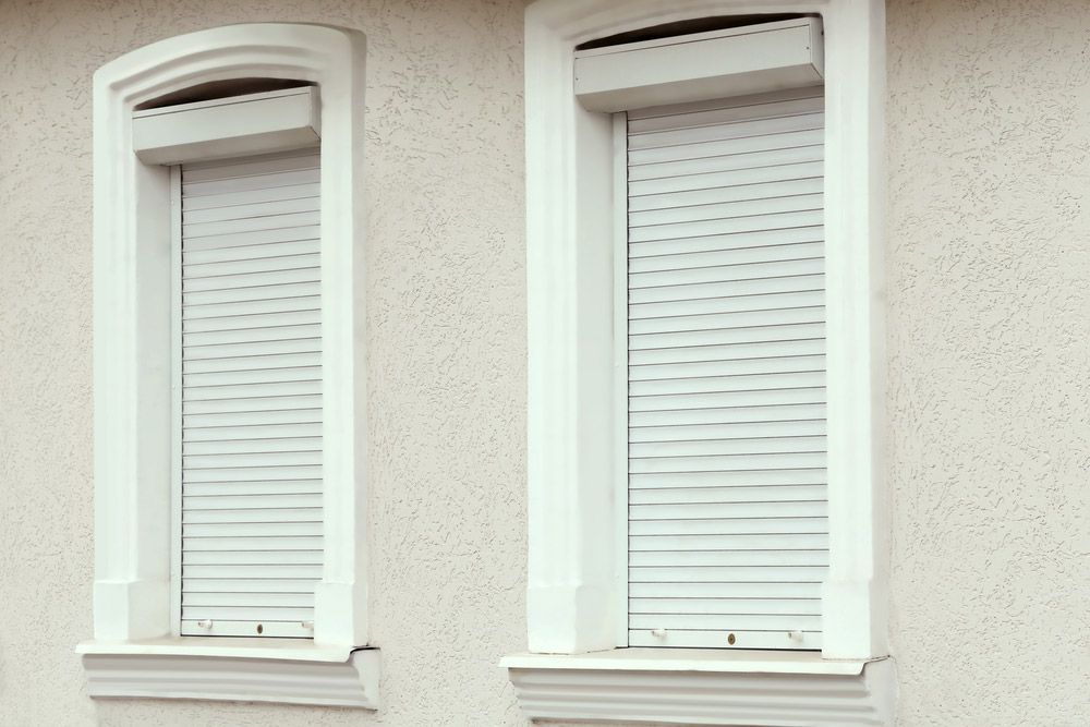 Plastic Windows With Rolling Shutters — Wholesale Window Coverings in Port Stephens, NSW